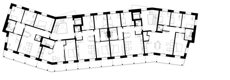 2 Die polygonale Gebäudeform sorgt für eine optimale Belichtung aller Räume. Massive Außenwände und kompakt gestaltete Wohnungen ermöglichen eine effiziente Raumnutzung und tragen zur passiven Temperierung bei.