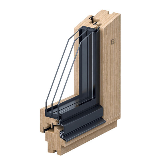 Das Hybrid-Holzfenster HF 68 HY Shape ermöglicht Dreifachverglasungen bis 48 mm bei schlanker Bautiefe und setzt mit seinem umlaufenden Schattenfuge architektonische Akzente.