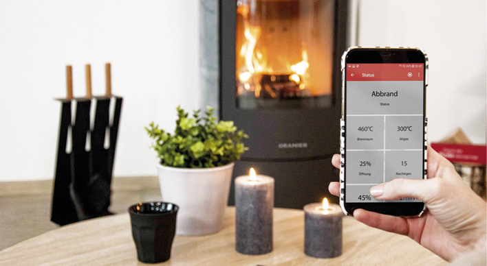 Die Conflame-Steuerung hilft, Holz schadstoffarm zu verbrennen.