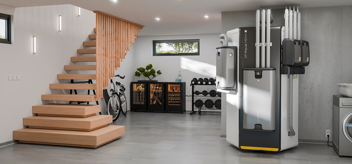 Das Solarwärmesystem Aqua Solar+ bildet eine kompakte Heizzentrale aus Speicher, Steuerung und Frischwasserstation, dass von CPC-Vakuumröhrenkollektoren gespeist wird.